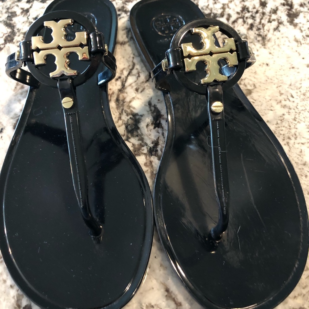 Tory Burch t strap jelly sandals.